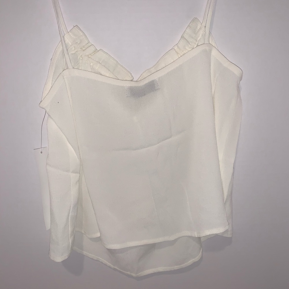 Lightweight white dressy tank.
